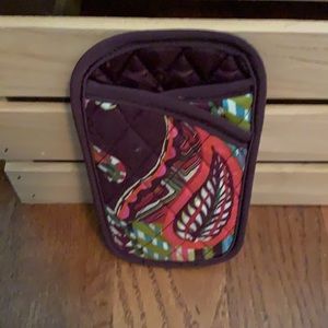 Vera Bradley eye glass case. New. Never used. Pocket in front as well.